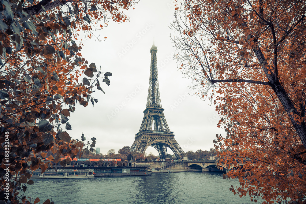 Eiffel tower at paris from the river seine in autumn season , paris , france , europe