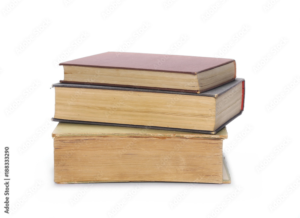 Stack of old antique big books isolated on white background Stack of old antique big books isolated on white background
