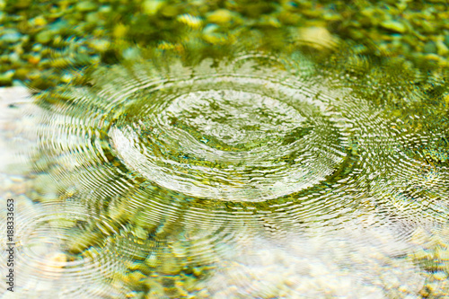 Circles on the smooth surface of the water on the river