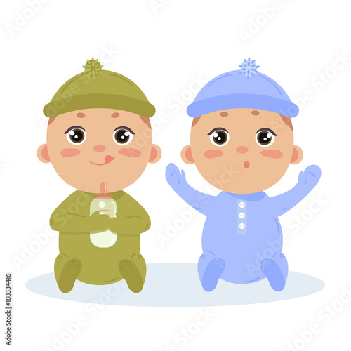 Newborn baby boy twins in long sleeved footies and scratch mittens. Sitting with nipple and milk bottle. Cute little children in blue and green isolated on white background