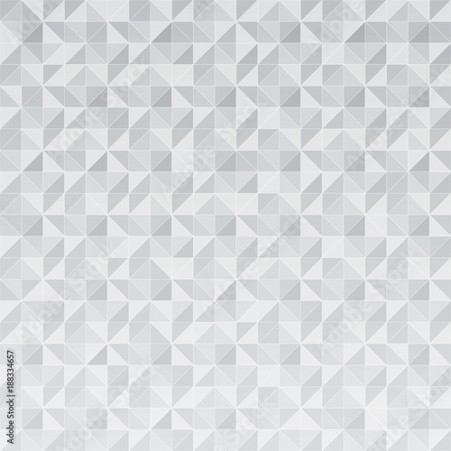 Abstract geometric triangle pattern mosaic on gray and white color background.
