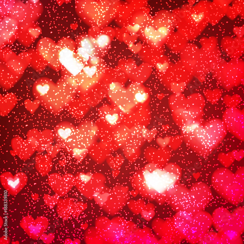 Abstract romantic red background with hearts and bokeh lights. St. Valentine's day wallpaper. Blurred glow soft backdrop. Vector illustration.