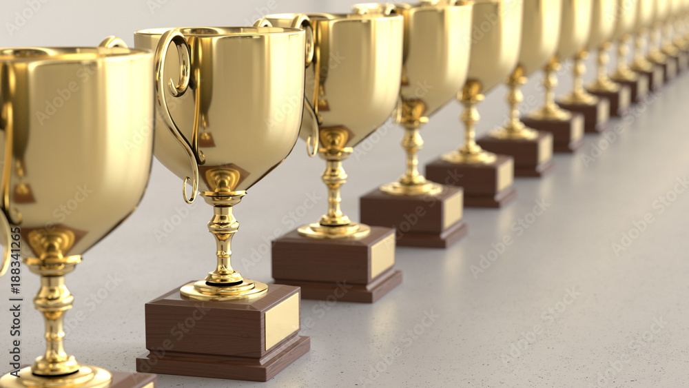 Linear Array of Gold Trophys on a Light Gray Surface Linear Array of Gold Trophys on a Light Gray Surface