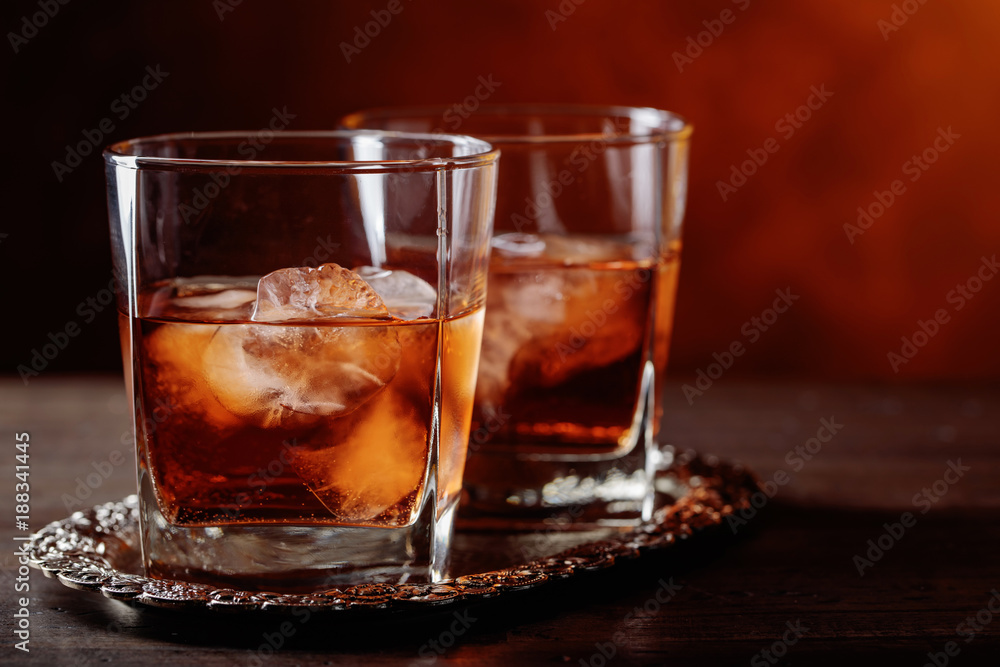 Glass of scotch whiskey and natural ice . Glass of scotch whiskey and natural ice .