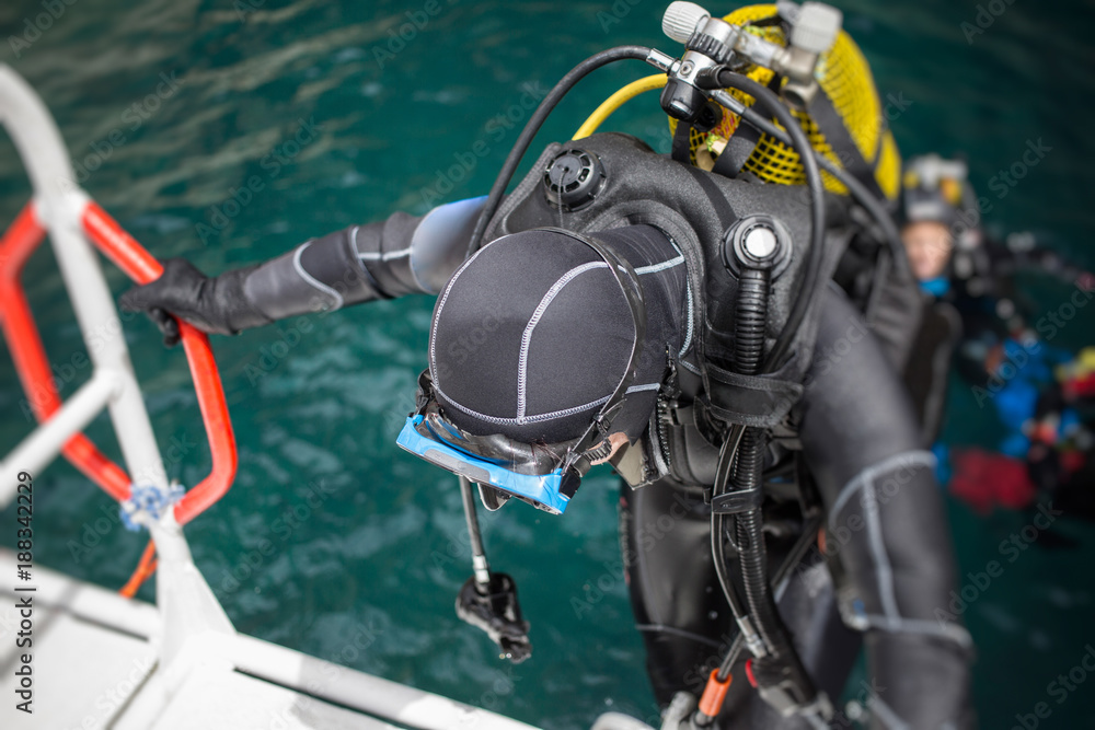 Scuba diver getting on board