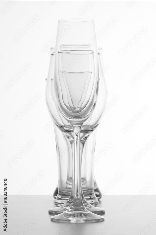 Empty glasses of champagne, red wine and beer on white background
Empty glasses of champagne, red wine and beer on white background