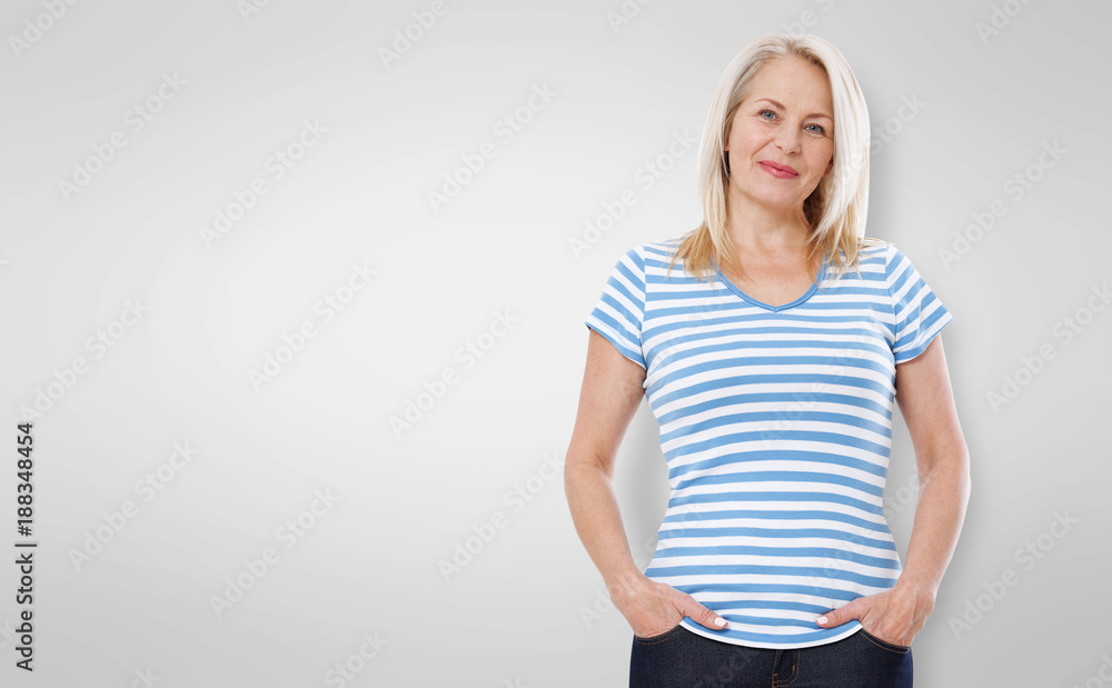 Friendly smiling middle-aged woman isolated on white background Friendly smiling middle-aged woman isolated on white background