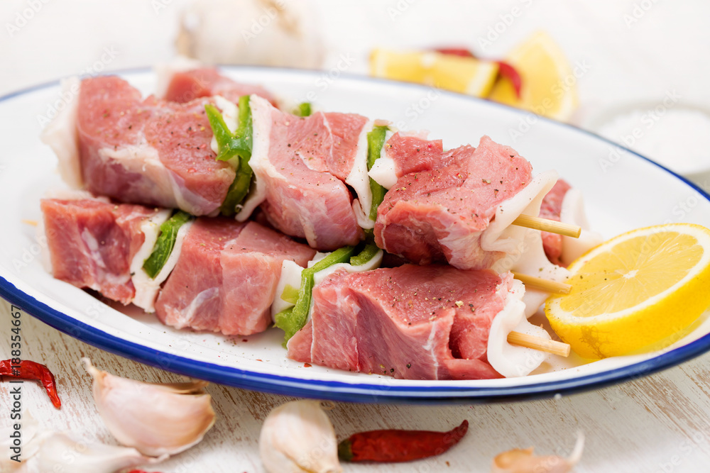 raw turkey fillet with pepper and lemon