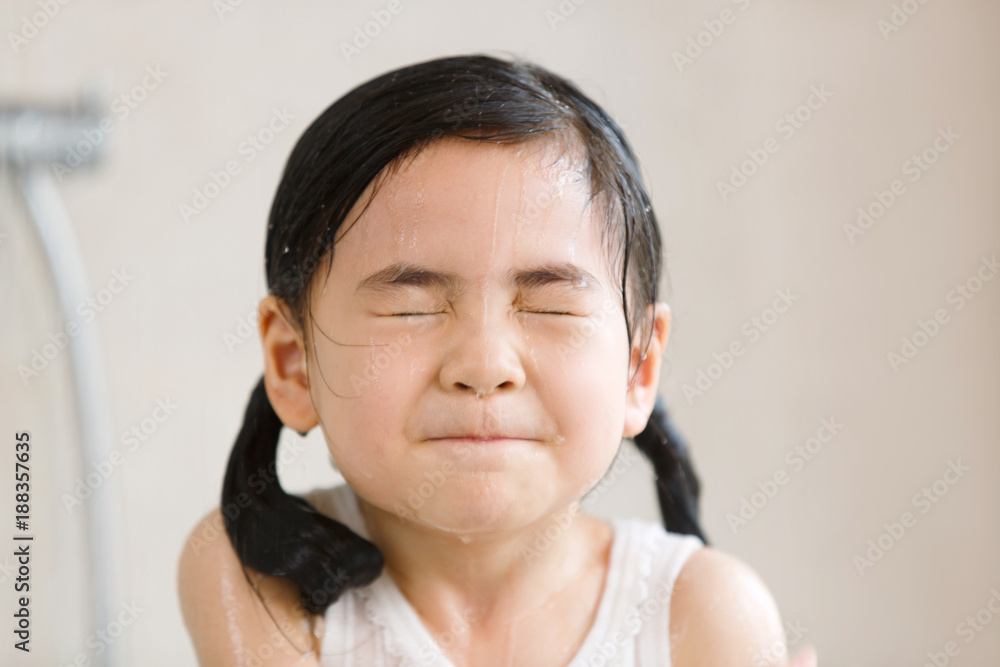 The lovely little girl is taking a bath Stock Photo Adobe Stock