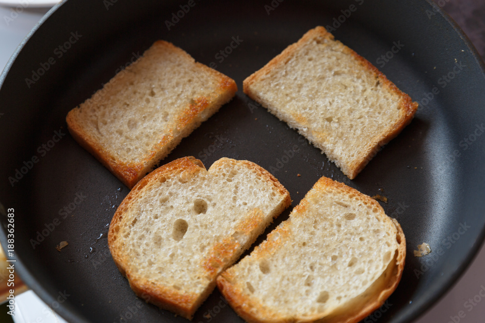 Slices of toast bread on wooden table, top view Slices of toast bread on wooden table, top view