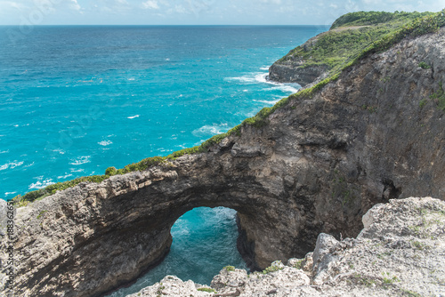 Guadeloupe, Marie-Galante island, the hole "Gueule Grand Gouffre", a beautiful seascape with a natural arch in the cliffs 