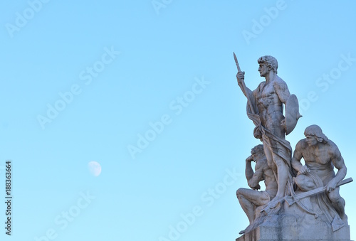 Statues of National monument also known as Altar of the Fatherland with the new moon