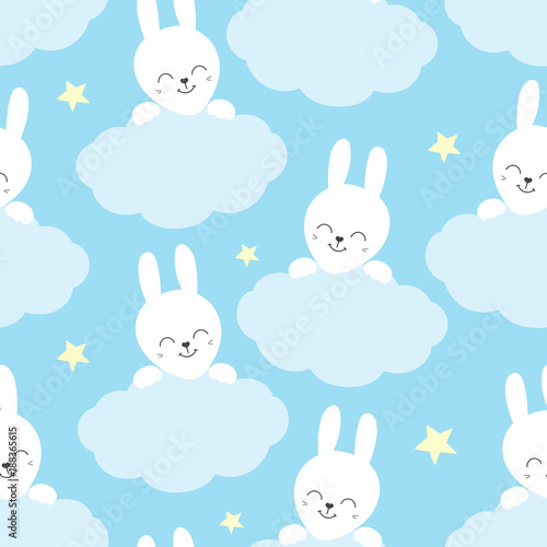 Cute baby pattern with little bunny. Cartoon animal kids print vector seamless. Sweet background with white rabbit and clouds for children fabric, home textile, nursery poster or birthday party. © irinelle
