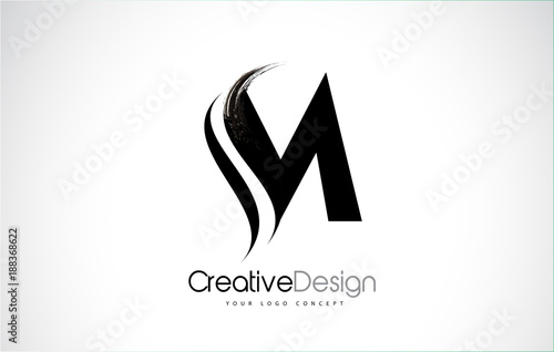 M Letter Design Brush Paint Stroke photo