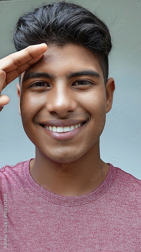 Youthful Teen Male Saluting Youthful Teen Male Saluting