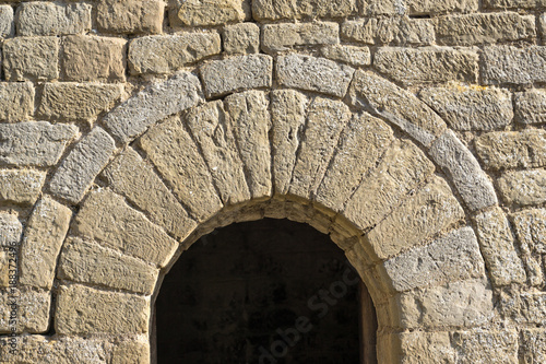 semicircular arch at the entrance of a small chapel Romanesque architecture style. half-point arch