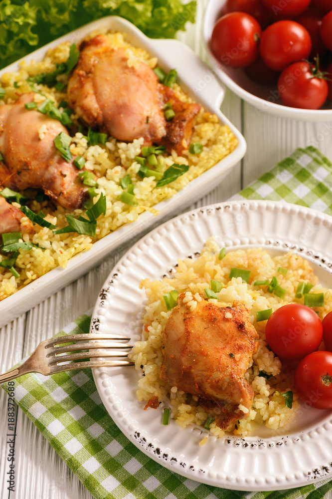 Oven baked chicken meat with rice. Oven baked chicken meat with rice.