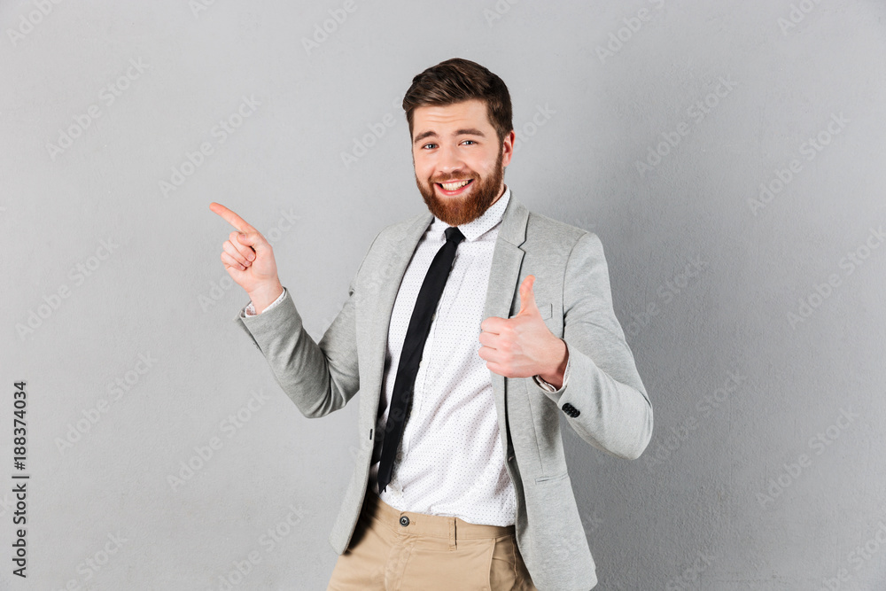 Portrait of an excited businessman dressed in suit Portrait of an excited businessman dressed in suit