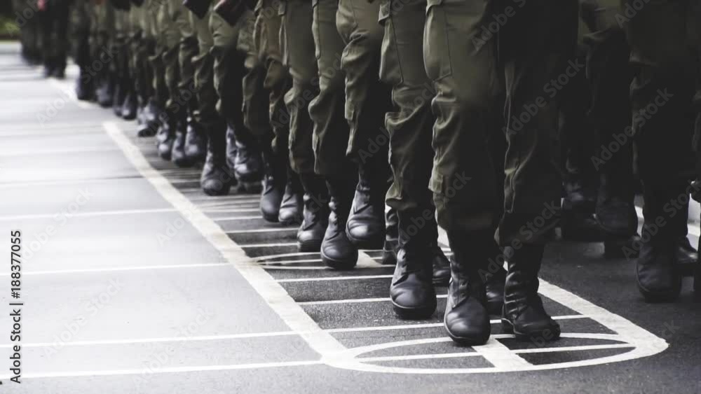 soldiers march, stand on parade ground with weapons in hands hold in hand the automatic machine on the street military oath. recruitment. National Guard. rain day soldiers march, stand on parade ground with weapons in hands hold in hand the automatic machine on the street military oath. recruitment. National Guard. rain day