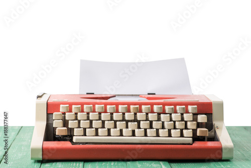 A typewriter on a table with an isolated background