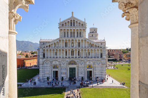 The facade of the Cathedral Duomo with the Leaning Tower Torre pendente in the background photographed from the Baptistery Battistero - Pisa, Tuscany, Italy photo