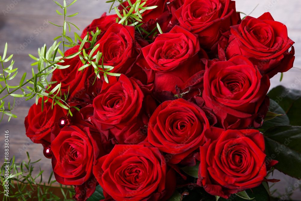 Naklejka premium Luxury bouquet made of red roses in flower shop Valentines Bouquet of red roses