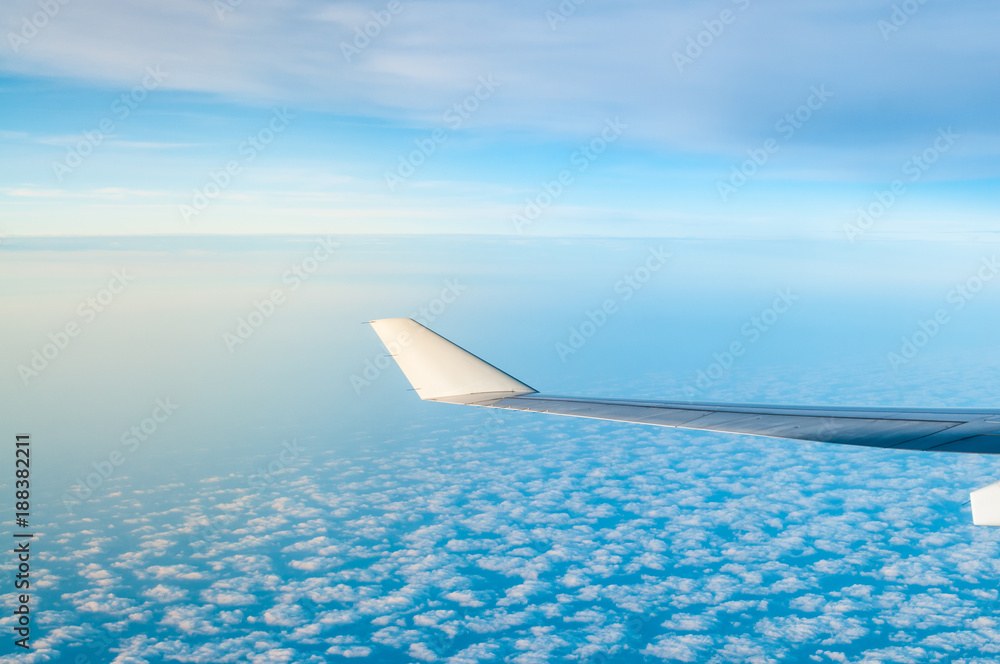 Airplane wing with clouds. Airplane wing with clouds.