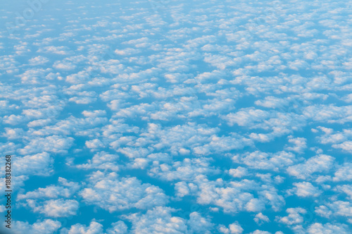 View on top from airplane with clouds