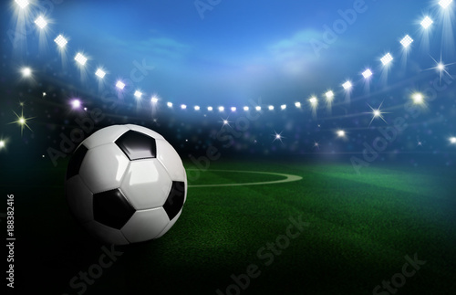 3D Rendered black and white soccer ball on green field in the football stadium © Kaikoro