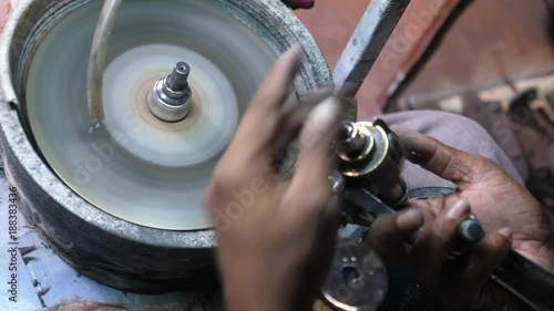 Craftsman Showing Old Technique Of Gem Cutting And Faceting In Sri Lanka. Closeup. 4K. photo