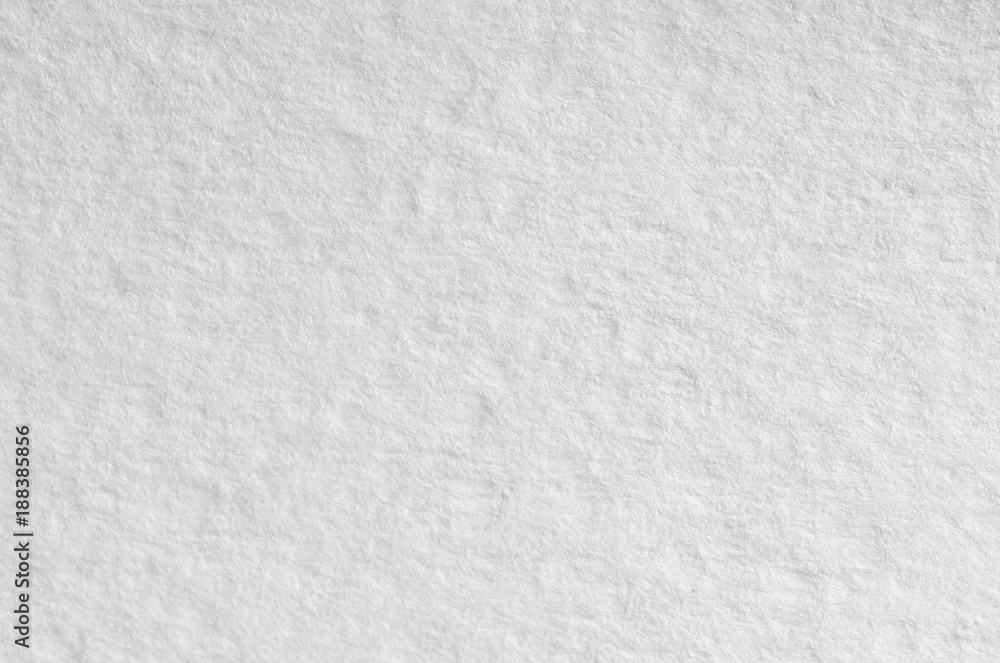 Texture of thick paper intended for watercolor painting. Macro snapshot of  details of the relief paper structure Stock Photo