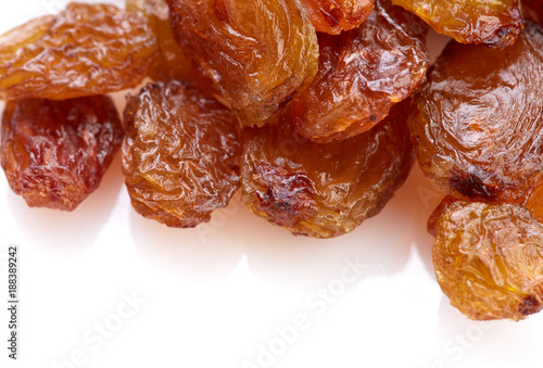 Raisins on a white background. Dried grapes.