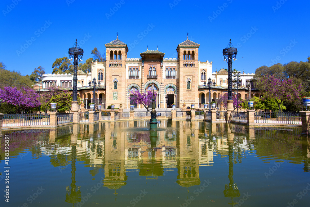 The mudejar pavilion and pond placed in the Plaza de America, houses the Museum of Arts and Traditions of Sevilla, Andalusia,