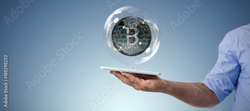 Composite image of man holding digital tablet