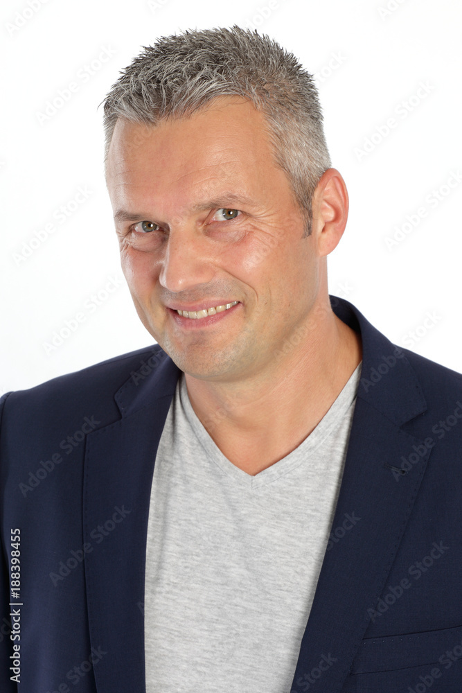Mann 40 plus mit zuversichtlichem Blick StockFoto Adobe Stock