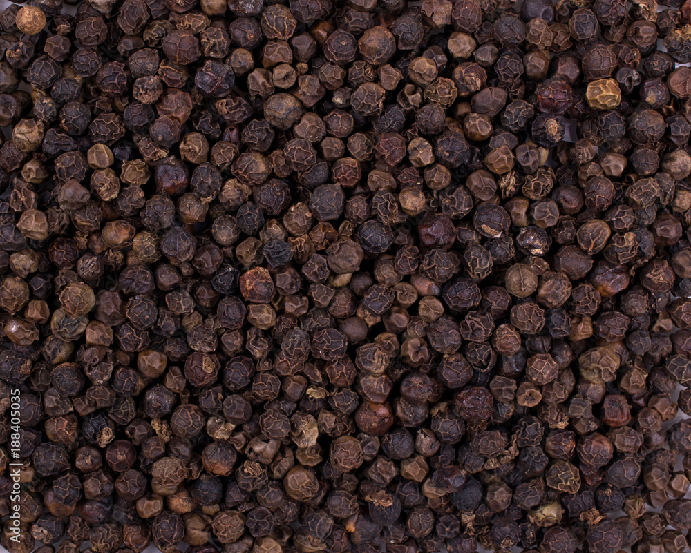 Texture background. Black pepper seeds Top view Texture background. Black pepper seeds Top view