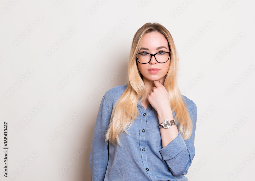 beautiful young woman with long hair wearing glasses and wrist watch