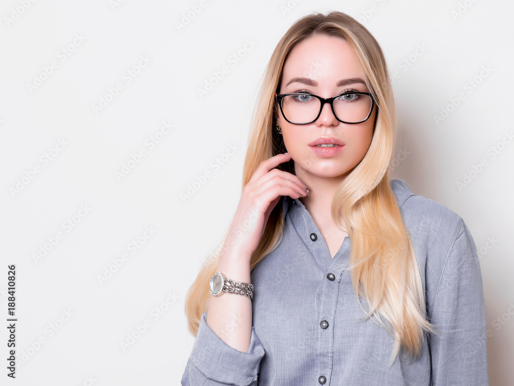 beautiful young woman with long hair wearing glasses and wrist watch