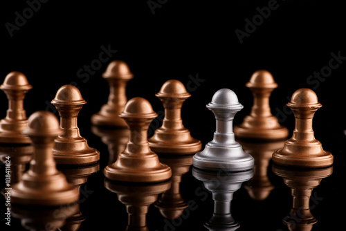 Confrontation between chess pawns