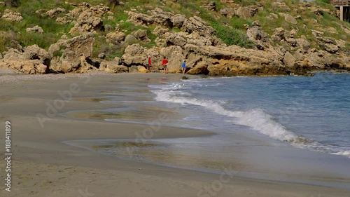 Family Walking On Beach; Plakias To Frangokastello; Frangokastello, Crete, Greece photo