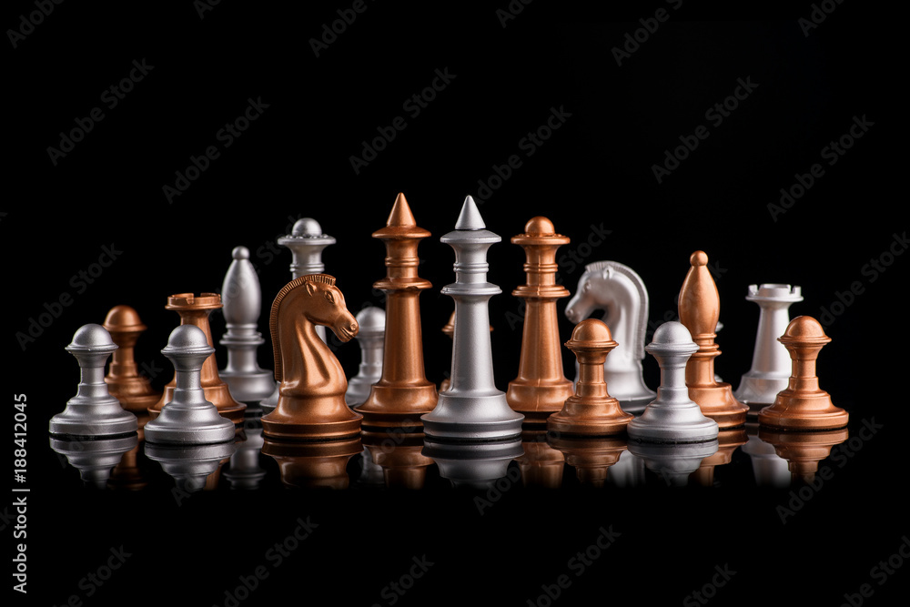 A series of gold and silver chess pieces A series of gold and silver chess pieces