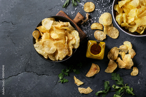 Bowl of home made potato chips photo