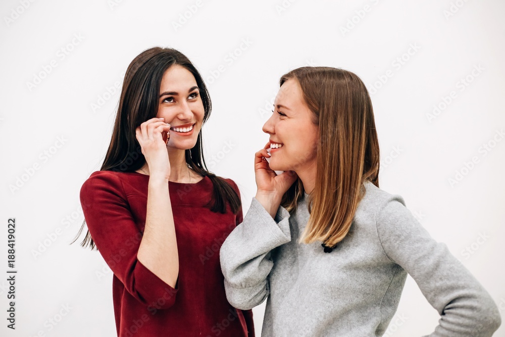 Girl talking on the phone on white background Girl talking on the phone on white background