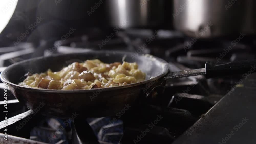 Cooking omelette in pan, close up Cooking omelette in pan, close up
