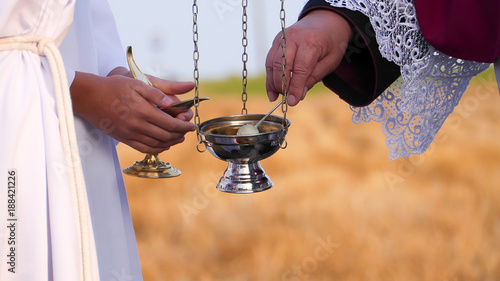 ordination of the chapel by Catholic priest censer rite smoke