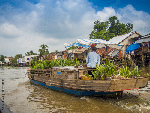 Boat sailing through the mekong delta