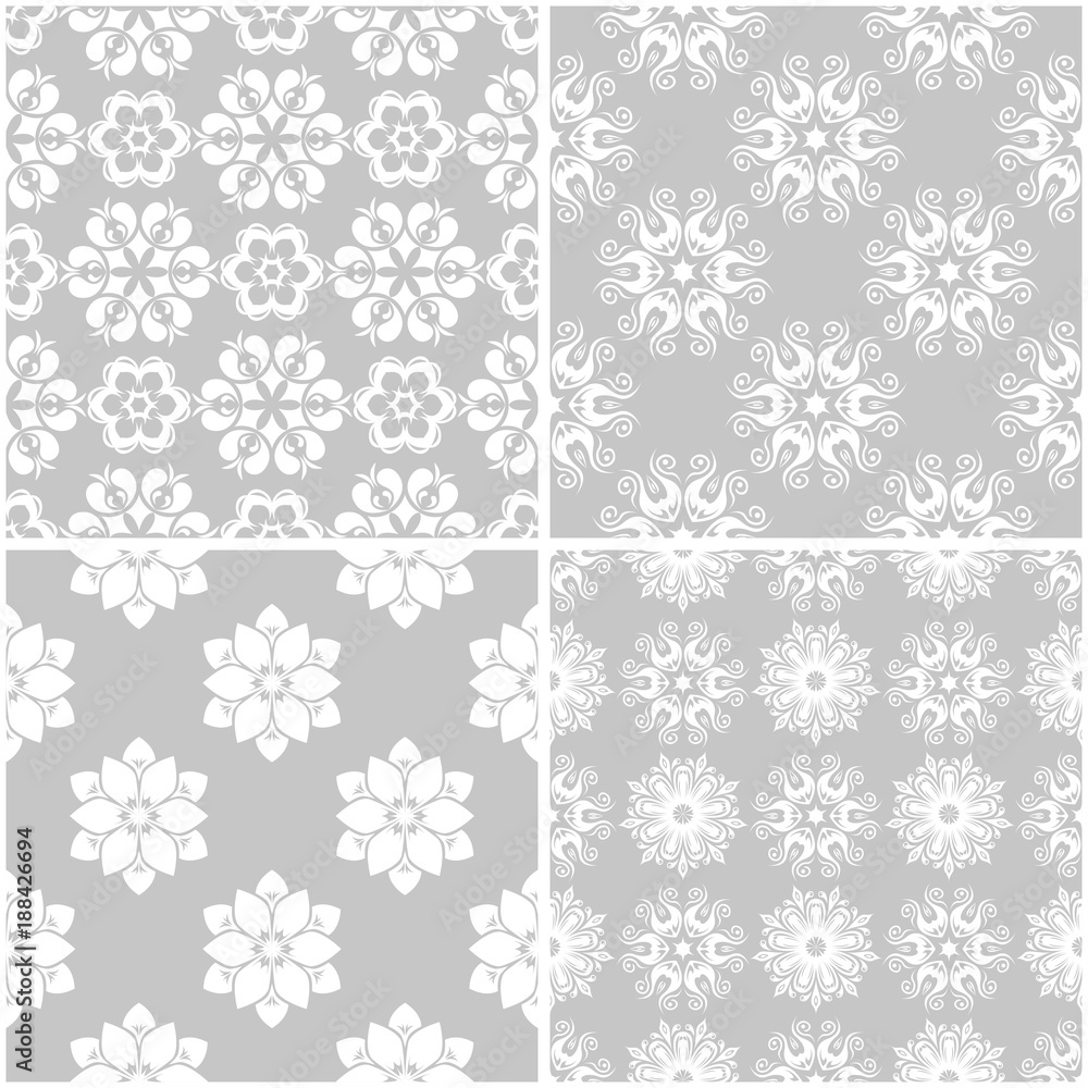 Floral patterns. Set of gray and white seamless backgrounds Floral patterns. Set of gray and white seamless backgrounds