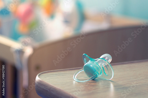 pacifier in baby room photo