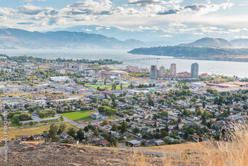 Downtown Kelowna in autumn viewed from Knox Mountain with Okanagan Lake and William R. Bennett bridge in distance photo