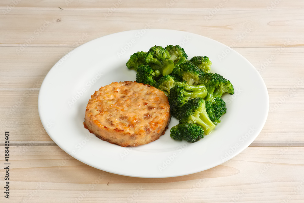 Meat cutlet with cheese and broccoli Meat cutlet with cheese and broccoli